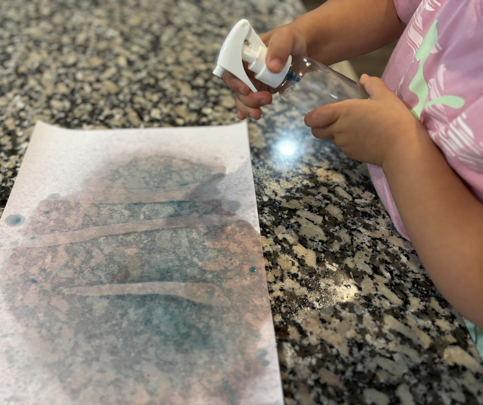 Spray bottle fine motor skills activity